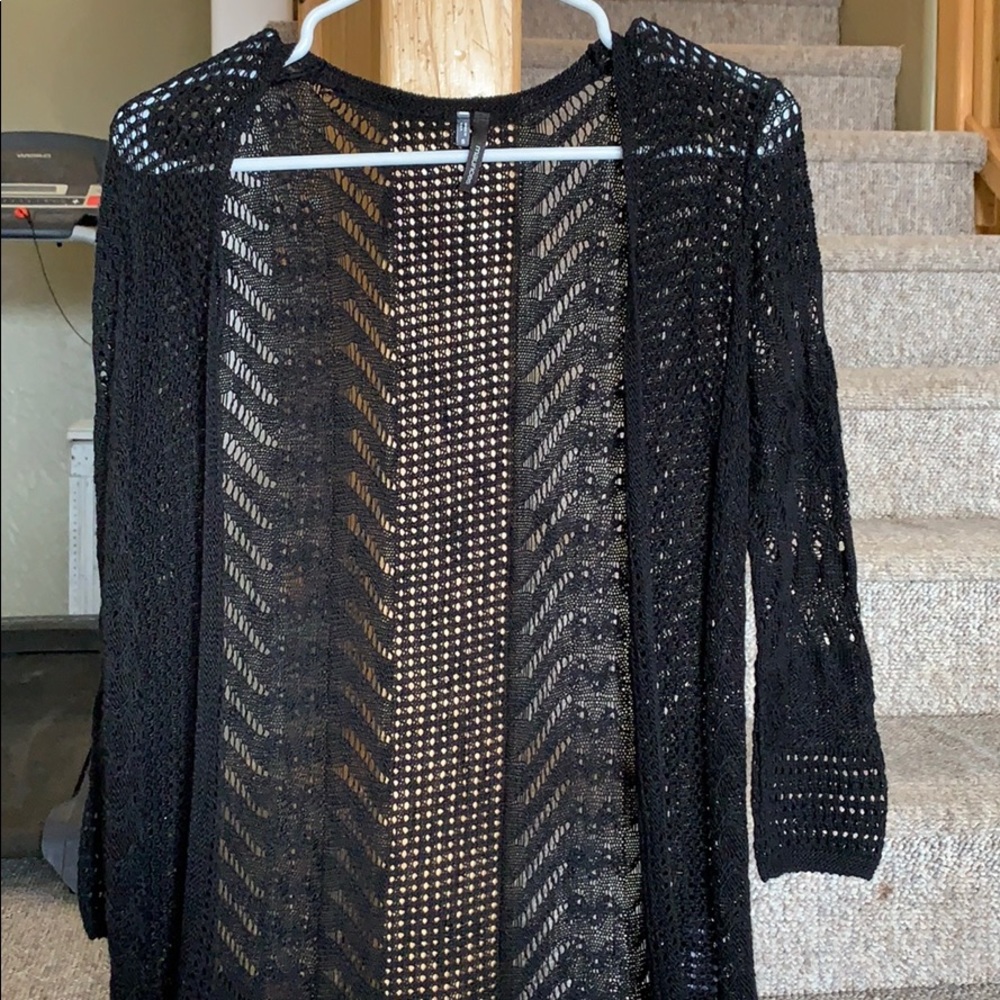 Maurice’s black cardigan